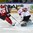 PARIS, FRANCE - MAY 13: Switzerland's Leonardo Genoni #63 makes a pad save on Canada's Nate Mackinnon #29 during preliminary round action at the 2017 IIHF Ice Hockey World Championship. (Photo by Matt Zambonin/HHOF-IIHF Images)
